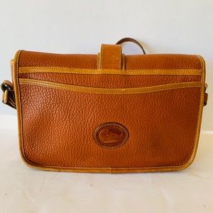 Dooney and Bourke Vintage pebble leather satchel brown color in good condition